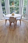 Quick Step Impressive Classic Beige laminate flooring in dining room